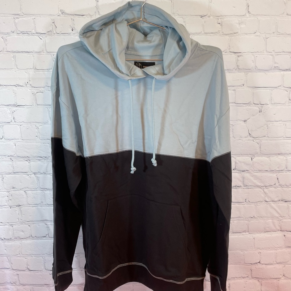 Original ice pullover hoodie. Soft blue top and blackened bottom.  NWT
